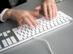 Speedy Typing On Keyboard Stock Photo