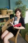 Portrait Of Thai Adult Women Office Beautiful Girl Reading Book Stock Photo