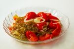 Marinated Tomatoes On A Plate Of Home Cooking Stock Photo