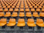 Orange Seats On The Stadium Stock Photo