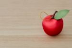 Fake Red Cherry On Wood Stock Photo