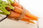 Baby Carrots Bunch Tied With Rope Stock Photo