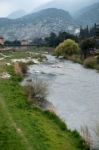 The River Sarca Flowing Through Arco Trentino Italy Stock Photo