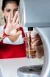 Girl Filling Glass With Chocolate Shake Stock Photo