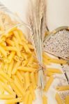 Italian Pasta Penne With Wheat Stock Photo