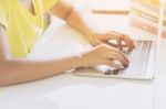 Hands Of Children Using Laptop Computer Stock Photo