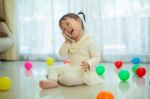 Little Girl Talking On Mobile Phone Stock Photo