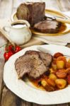 Roast Beef Joint With Roast Vegetables Stock Photo