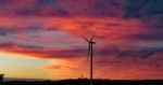 Sunset & Wind Turbines Stock Photo