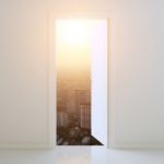 Door Open To City At Sunset Background Stock Photo