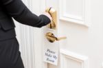 Woman Swiping Card To Access The Room Stock Photo