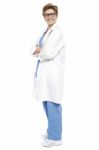 Full Length Portrait Of A Smiling Female Doctor Stock Photo