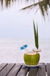 Coconut Water Drink Served In Coconut With Drinking Straw On The Stock Photo