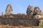 Ruins Of Phnom Bakheng Temple At Angkor Wat Complex Stock Photo