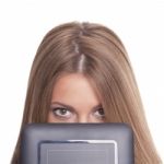 Beautiful Woman Hiding Face With Tablet Computer Stock Photo