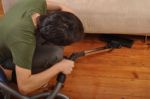 Man Doing The Housework Stock Photo