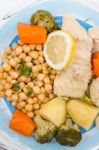 Codfish With Chickpeas And Vegetables Stock Photo