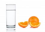 Water Of Glass With Orange Isolated On The White Background Stock Photo