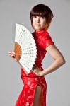 Chinese Model In Traditional Cheongsam Dress Stock Photo