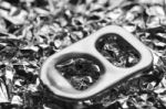 Close Up Of Metal Ring Pulls On Foil Background Stock Photo