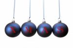 Four Blue Christmas Balls With Letters Of Word Xmas Stock Photo