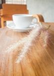 Hot Coffee Cup On Wooden Table Stock Photo