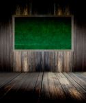 Abstract The Green Blackboard On Grunge Wall Stock Photo