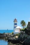 Lighthouse In Cascais, Portugal Stock Photo