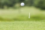 Golf Ball Just Coming Off The Tee Stock Photo