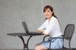 Portrait Of Thai Adult Businesswoman Beautiful Girl Using Computer Notebook Stock Photo