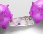 Piggybanks Fighting Over Money Showing Savings Stock Photo