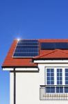 House Roof Covered With Solar Panel Stock Photo