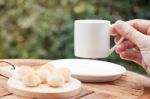 Woman's Hand Holding Coffee Cup Stock Photo