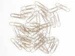 Pile Of Metal Paperclips Isolated Stock Photo