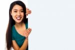 Asian Girl Holding Blank White Ad Board Stock Photo