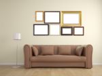 Picture Frame On Wall And Sofa Furniture Interior Design Stock Photo