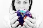 Woman Holding World In Hands Stock Photo