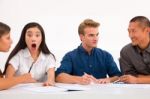 Surprised Businesswoman With Her Colleagues Workplace Stock Photo