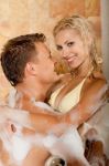 Affectionate Couple Having Bath Stock Photo