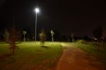 Night Public Park In The City With Houses Near Stock Photo