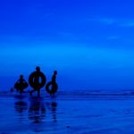 Silhouette People At Beach Stock Photo