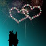 Couple Watching Heart Firework Stock Photo