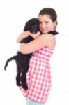 Girl Holding Dog Stock Photo