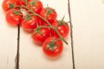 Fresh Cherry Tomatoes On A Cluster Stock Photo