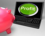 Profit Button On Laptop Shows Financial Growth Stock Photo