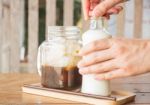 Homemade Iced Coffee Ingredient On Wooden Table Stock Photo