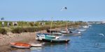 Some Brightly Coloured Boats At Wells Stock Photo