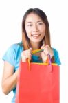 Asian Woman Holding Shopping Bag Stock Photo