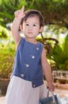 Girl Relaxing In The Backyard. Outdoor Shot Stock Photo