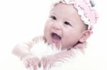 Asian Laughing Baby Stock Photo